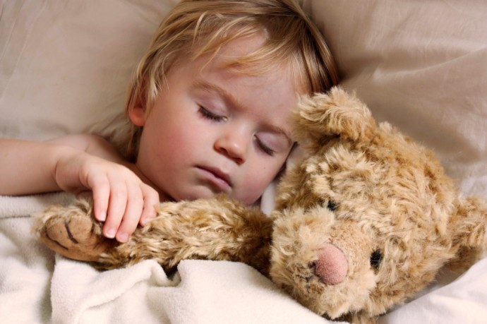 baby toddler asleep with teddy bear